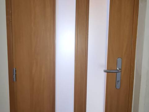 Porte d'entrée bois sur mesure à Munster