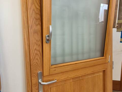 Porte d'entrée bois sur mesure à Wettolsheim