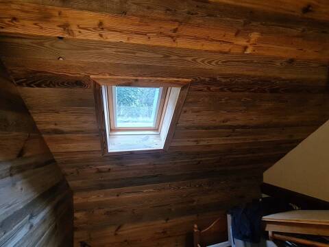 Habillage d'un mur en bois sur Sondernach