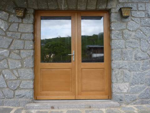 Porte d'entrée bois sur mesure à Muhlbach